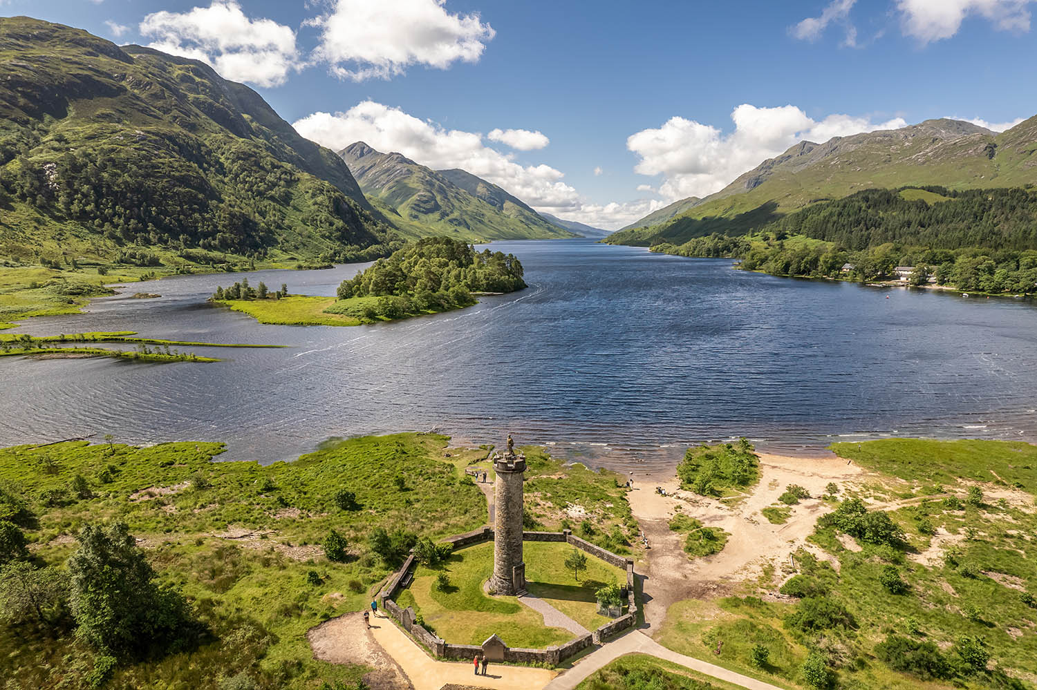 The drone aerial view of Glenfinnan monument and Loch Shiel. Gle